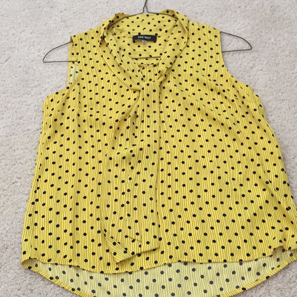 Sleeveless yellow blouse